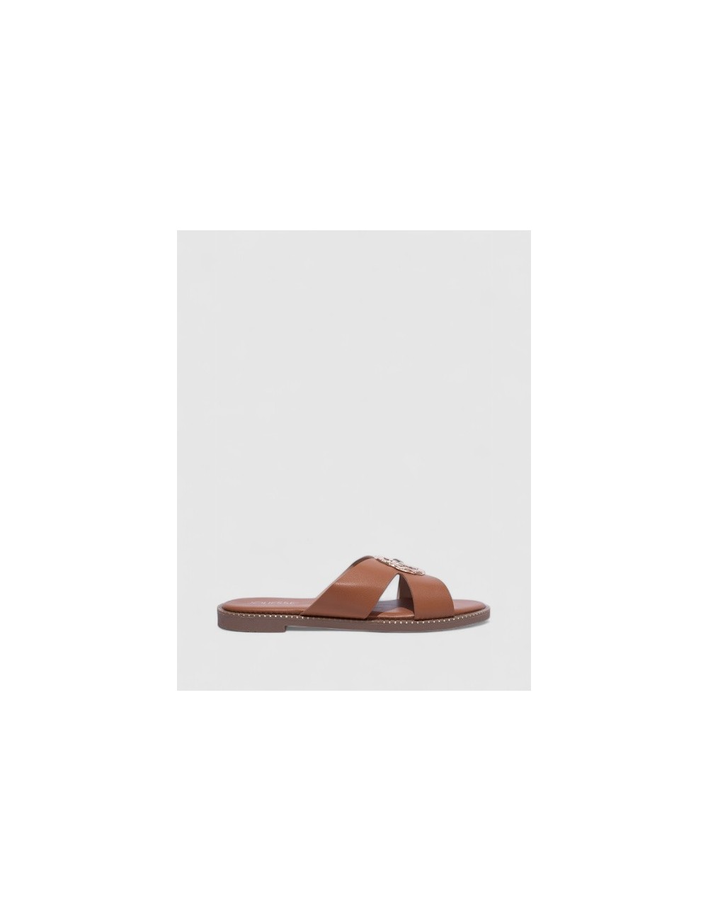 Cette image contient Mules Plates en Cuir Cognac avec Ornements chez Joliesse. à 59,99 TND en Tunisie. L'hexa de l'arrière plan Cette image contient Mules Plates en Cuir Cognac avec Ornements chez Joliesse. à 59,99 TND en Tunisie. L'hexa de l'arrière plan
