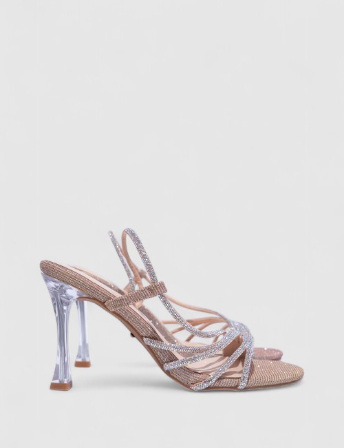 Cette image contient Talons Scintillantes avec Brides Fines chez Joliesse. à 129,99 TND en Tunisie. L'hexa de l'arrière plan est