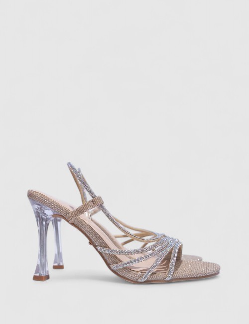 Cette image contient Talons Scintillantes avec Brides Fines chez Joliesse. à 129,99 TND en Tunisie. L'hexa de l'arrière plan est