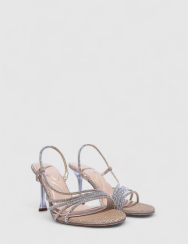 Cette image contient Talons Scintillantes avec Brides Fines chez Joliesse. à 129,99 TND en Tunisie. L'hexa de l'arrière plan est