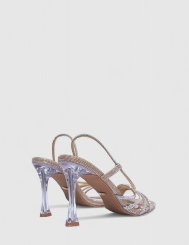 Cette image contient Talons Scintillantes avec Brides Fines chez Joliesse. à 129,99 TND en Tunisie. L'hexa de l'arrière plan est