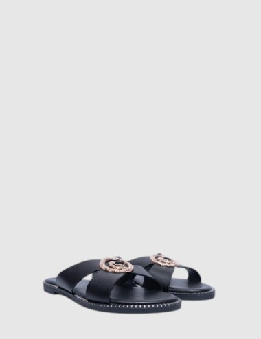 Cette image contient Mules Plates en Cuir Cognac avec Ornements chez Joliesse. à 59,99 TND en Tunisie. L'hexa de l'arrière plan 