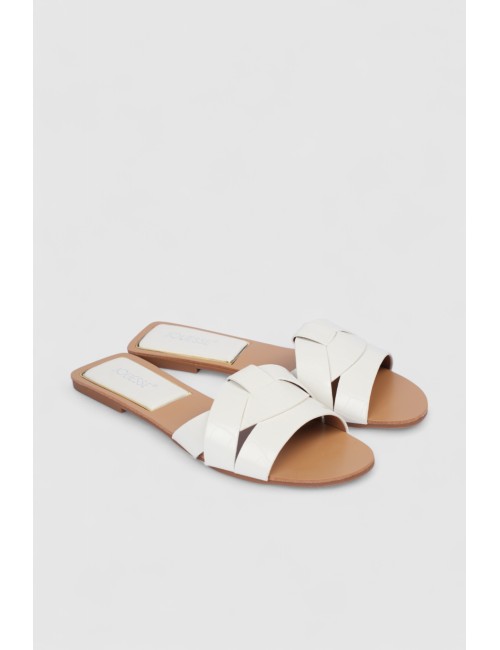 Mules plates à brides