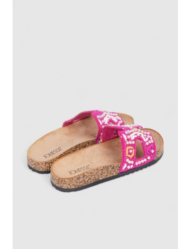 Cette image contient Mules à bride croisée avec bijoux chez Joliesse. à 79,99 TND en Tunisie. L'hexa de l'arrière plan est #E7E7
