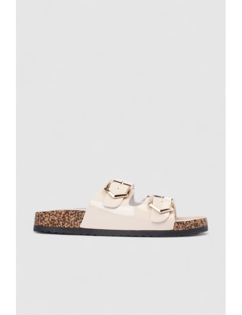 Mules à brides cloutées et...