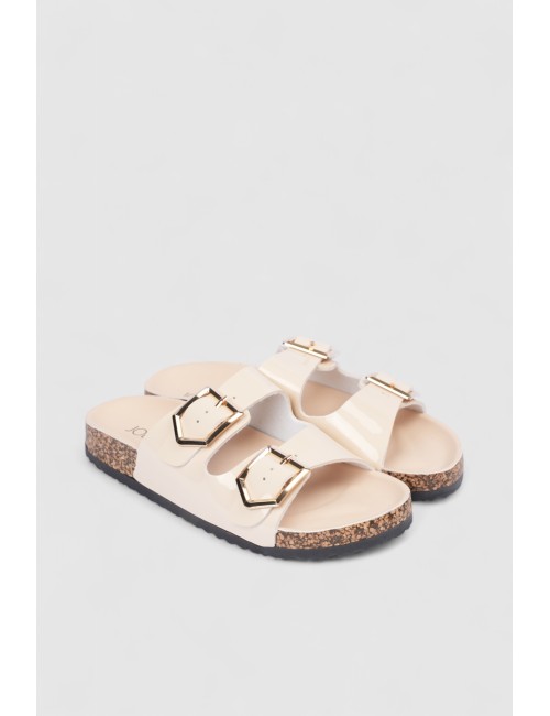 Mules à brides cloutées et...