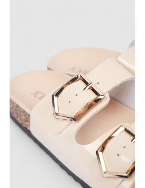Mules à brides cloutées et...