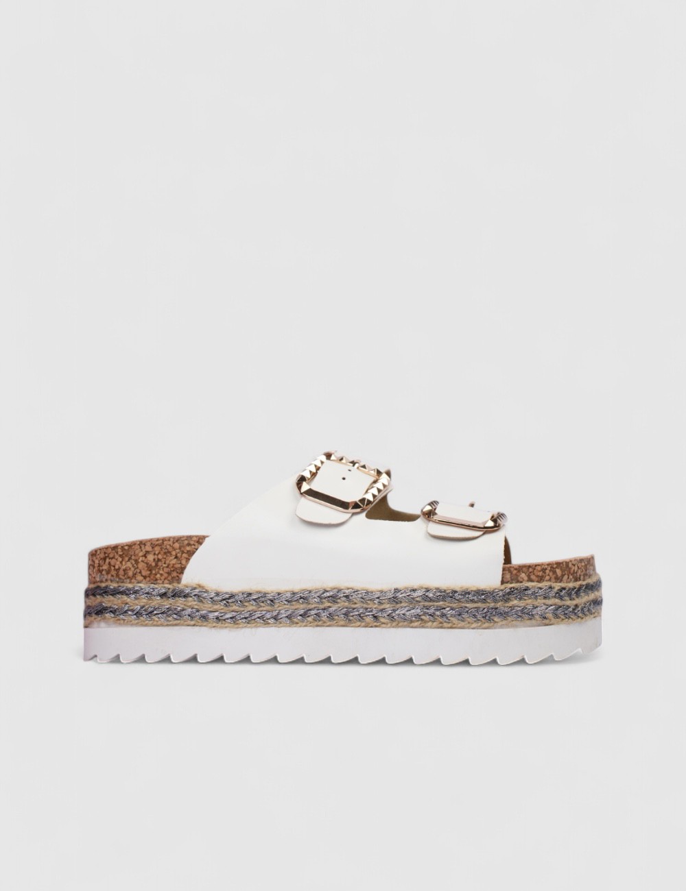 Cette image contient Mules à boucles dorées avec semelle plateforme chez Joliesse. à 84,99 TND en Tunisie. L'hexa de l'arrière p Cette image contient Mules à boucles dorées avec semelle plateforme chez Joliesse. à 84,99 TND en Tunisie. L'hexa de l'arrière p
