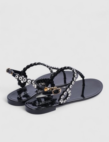Cette image contient Nu-pieds à bijoux argentées raffinés chez Joliesse. à 89,99 TND en Tunisie. L'hexa de l'arrière plan est #E