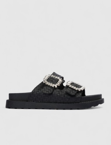 Cette image contient Mules à boucles chez Joliesse. à 84,99 TND en Tunisie. L'hexa de l'arrière plan est #E7E7E7