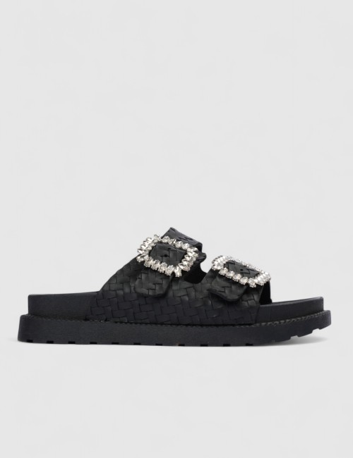 Cette image contient Mules à boucles chez Joliesse. à 84,99 TND en Tunisie. L'hexa de l'arrière plan est #E7E7E7
