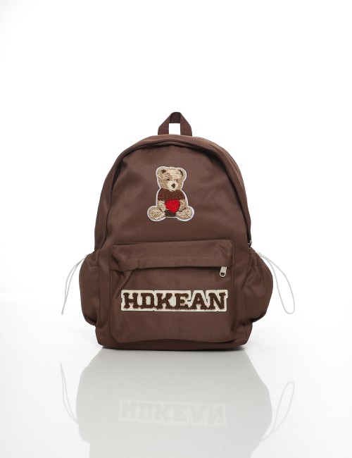 Cette image contient Sac à Dos Enfant Ourson Hokean chez Joliesse. à 79,99 TND en Tunisie. L'hexa de l'arrière plan est #E7E7E7