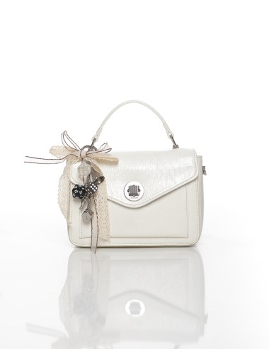 Cette image contient Sac à Main Élégant avec Décoration Ruban Joliesse chez Joliesse. à 119,99 TND en Tunisie. L'hexa de l'arriè