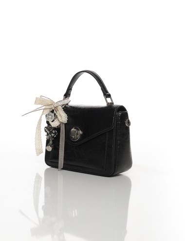 Cette image contient Sac à Main Élégant avec Décoration Ruban Joliesse chez Joliesse. à 119,99 TND en Tunisie. L'hexa de l'arriè