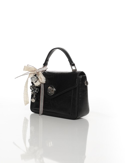 Cette image contient Sac à Main Élégant avec Décoration Ruban Joliesse chez Joliesse. à 119,99 TND en Tunisie. L'hexa de l'arriè