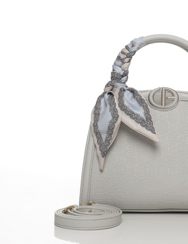 Cette image contient Sac à Main Imprimé avec Foulard Joliesse chez Joliesse. à 129,99 TND en Tunisie. L'hexa de l'arrière plan e