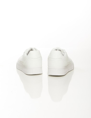 Cette image contient Baskets classiques unisexes blanches et noires chez Joliesse. à 79,99 TND en Tunisie. L'hexa de l'arrière p
