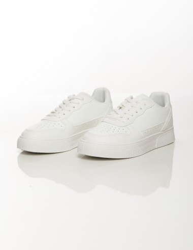Cette image contient Baskets classiques unisexes blanches et noires chez Joliesse. à 79,99 TND en Tunisie. L'hexa de l'arrière p