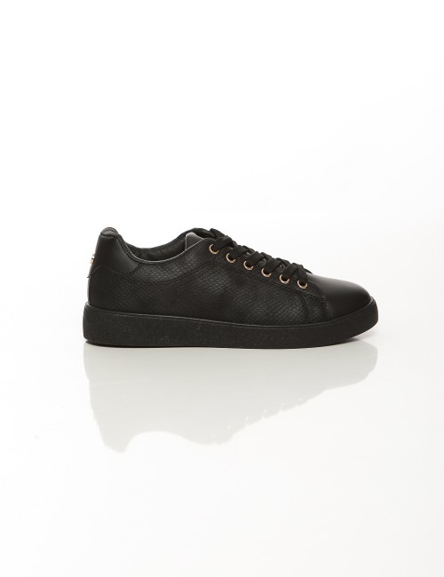 Cette image contient Baskets basses classiques, Noir et Blanc chez Joliesse. à 79,99 TND en Tunisie. L'hexa de l'arrière plan es