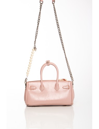 Cette image contient Sac à main rose avec chaîne et accessoires décoratifs chez Joliesse. à 129,99 TND en Tunisie. L'hexa de l'a