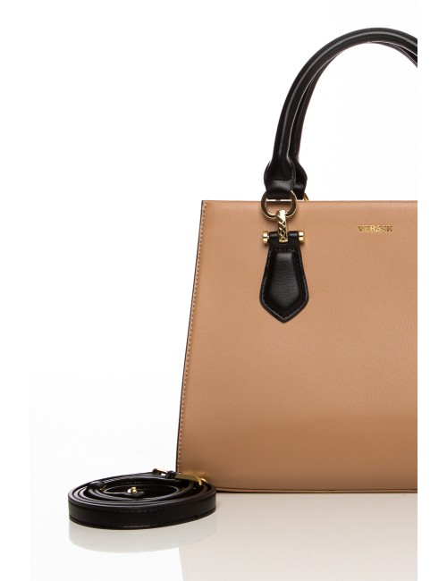 Cette image contient Sac à main en simili cuir beige et noir chez Joliesse. à 139,99 TND en Tunisie. L'hexa de l'arrière plan es