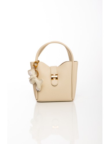Cette image contient Sac à main beige avec porte-clés chien décoratif et bandoulière chez Joliesse. à 109,99 TND en Tunisie. L'h