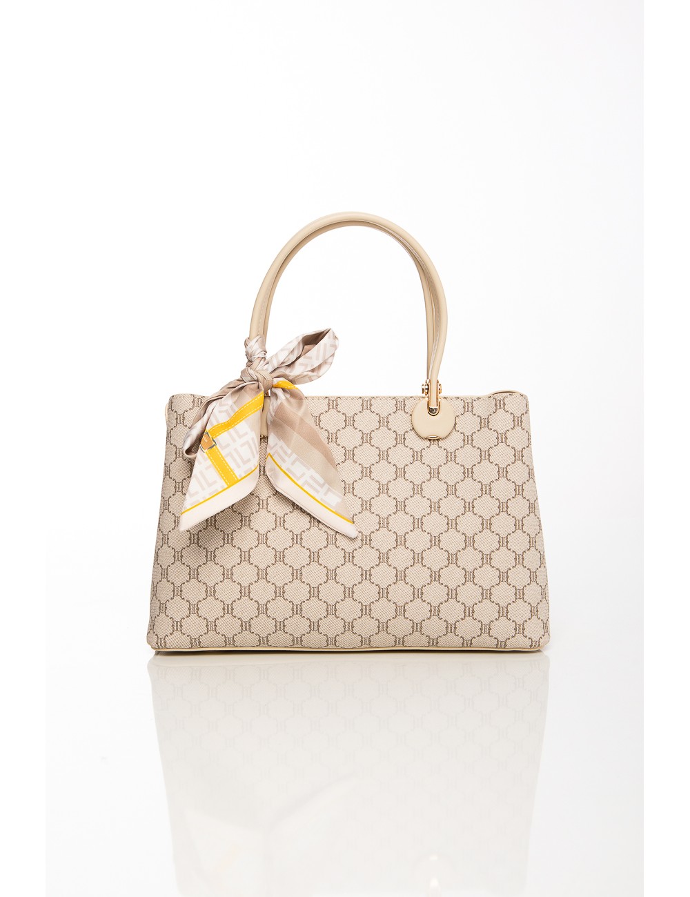 Cette image contient Sac à main élégant motif géométrique avec foulard décoratif chez Joliesse. à 129,99 TND en Tunisie. L'hexa 