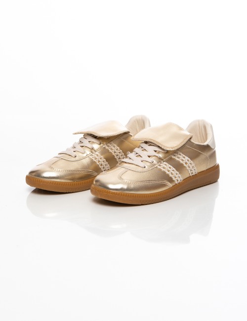 Cette image contient Baskets basses dorées et beige Style tendance et confort chez Joliesse. à 89,99 TND en Tunisie. L'hexa de l