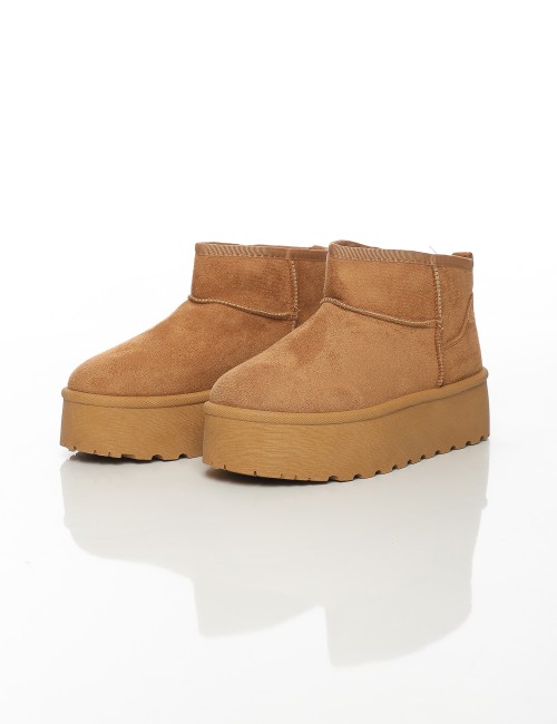 Cette image contient Bottines fourrées femme à semelle épaisse chez Joliesse. à 79,99 TND en Tunisie. L'hexa de l'arrière plan e