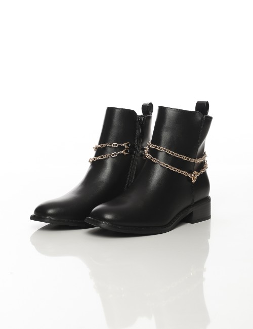 Cette image contient Bottines femme noires à chaînes dorées chez Joliesse. à 159,99 TND en Tunisie. L'hexa de l'arrière plan est