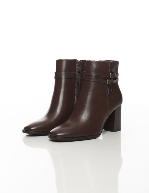 Cette image contient Bottines femme à talons hauts avec brides chez Joliesse. à 169,99 TND en Tunisie. L'hexa de l'arrière plan 