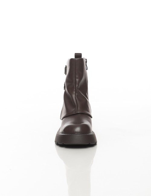 Cette image contient Bottines à semelle épaisse avec doubles boucles métalliques chez Joliesse. à 159,99 TND en Tunisie. L'hexa 