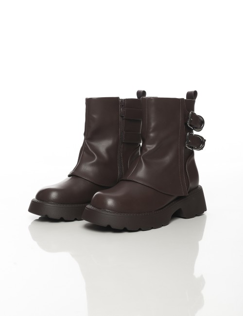 Cette image contient Bottines à semelle épaisse avec doubles boucles métalliques chez Joliesse. à 159,99 TND en Tunisie. L'hexa 