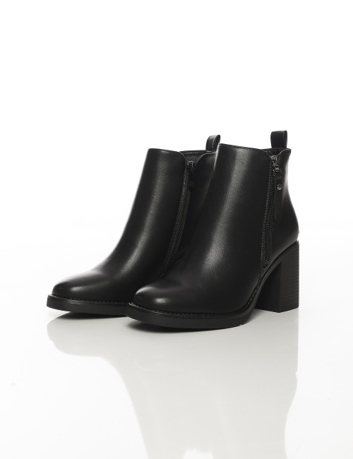 Cette image contient Bottines à talon carré avec fermeture zippée chez Joliesse. à 169,99 TND en Tunisie. L'hexa de l'arrière pl