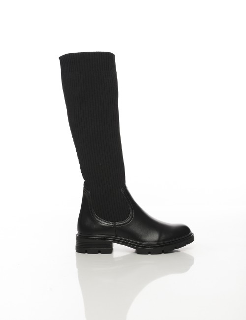 Cette image contient Bottes hautes noires avec tige en tissu côtelé chez Joliesse. à 169,99 TND en Tunisie. L'hexa de l'arrière 