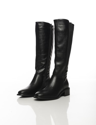 Cette image contient Bottes hautes noires à talon bas carré chez Joliesse. à 189,99 TND en Tunisie. L'hexa de l'arrière plan est