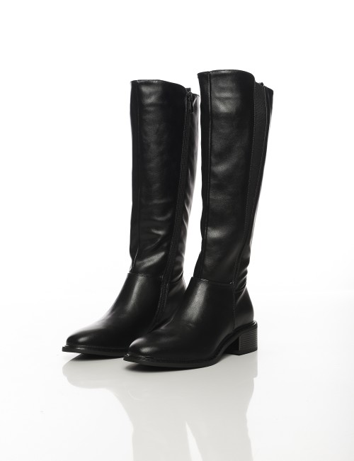 Cette image contient Bottes hautes noires à talon bas carré chez Joliesse. à 189,99 TND en Tunisie. L'hexa de l'arrière plan est