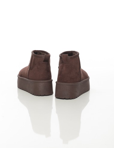 Cette image contient Bottines fourrées femme à semelle épaisse chez Joliesse. à 79,99 TND en Tunisie. L'hexa de l'arrière plan e