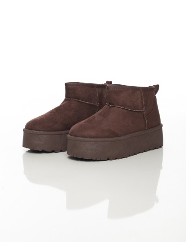 Cette image contient Bottines fourrées femme à semelle épaisse chez Joliesse. à 79,99 TND en Tunisie. L'hexa de l'arrière plan e