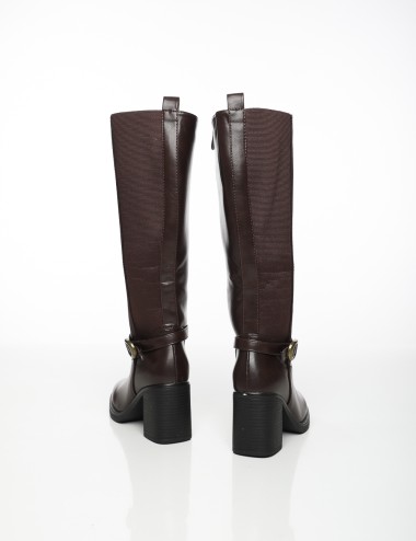 Cette image contient Bottes à Talons avec Boucle Latérale chez Joliesse. à 189,99 TND en Tunisie. L'hexa de l'arrière plan est #