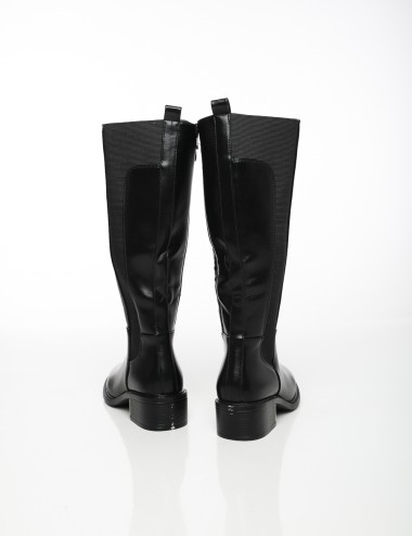 Cette image contient Bottes Hautes à Talon Bas chez Joliesse. à 189,99 TND en Tunisie. L'hexa de l'arrière plan est #E7E7E7