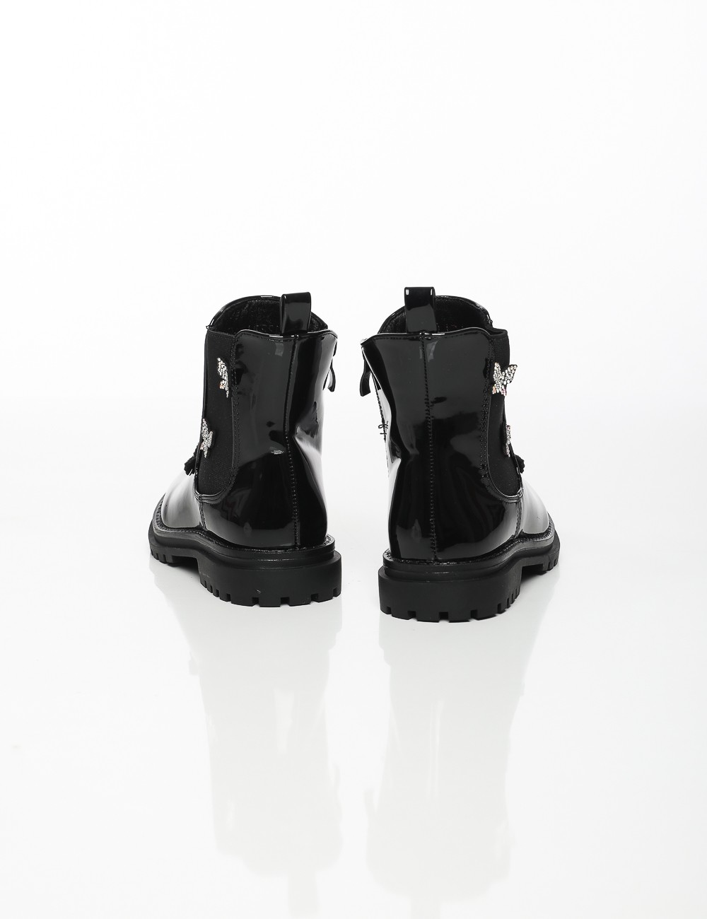 Cette image contient Bottines Vernies Papillons Strass chez Joliesse. à 109,99 TND en Tunisie. L'hexa de l'arrière plan est #E7E