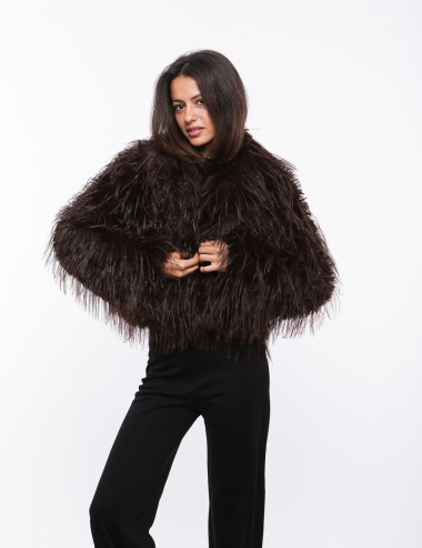 Cette image contient Veste Marron en fausse fourrure avec zip chez Joliesse. à 349,99 TND en Tunisie. L'hexa de l'arrière plan e