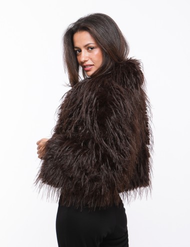 Cette image contient Veste Marron en fausse fourrure avec zip chez Joliesse. à 349,99 TND en Tunisie. L'hexa de l'arrière plan e