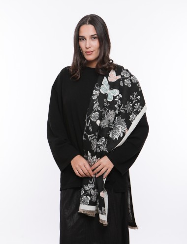 Cette image contient ECHARPE Noir imprimée chez Joliesse. à 69,99 TND en Tunisie. L'hexa de l'arrière plan est #E7E7E7