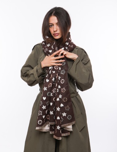 Cette image contient Écharpe pour femme imprimé chez Joliesse. à 64,99 TND en Tunisie. L'hexa de l'arrière plan est #E7E7E7