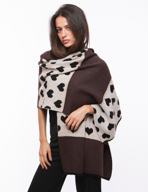 Cette image contient Écharpe en laine Avec motif cœur chez Joliesse. à 59,99 TND en Tunisie. L'hexa de l'arrière plan est #E7E7E