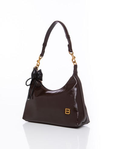 Cette image contient copy of Sac à Main Argenté à Paillettes chez Joliesse. à 109,99 TND en Tunisie. L'hexa de l'arrière plan es