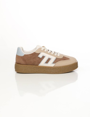 Cette image contient Baskets Basses Multi-Textures Design Rétro chez Joliesse. à 89,99 TND en Tunisie. L'hexa de l'arrière plan 