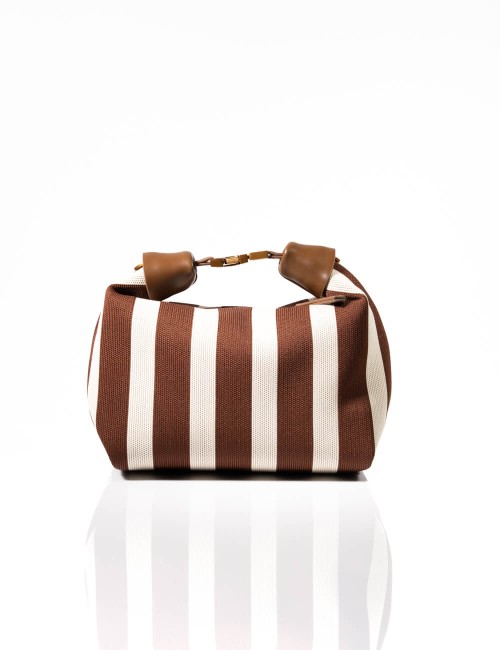 Cette image contient Sac à Main Cabas Rayures avec Chaîne Dorée chez Joliesse. à 139,99 TND en Tunisie. L'hexa de l'arrière plan